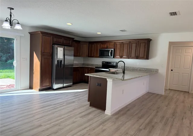 Photo 1 of Single family home for sale at 21046 SW Peach Blossom St, Dunnellon, FL 34431 | MLS# OM734559 | Listing updated on 2026-10-24