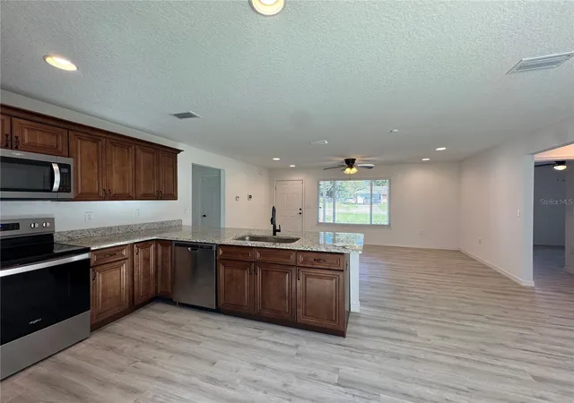 Photo 2 of Single family home for sale at 21046 SW Peach Blossom St, Dunnellon, FL 34431 | MLS# OM734559 | Listing updated on 2026-10-24