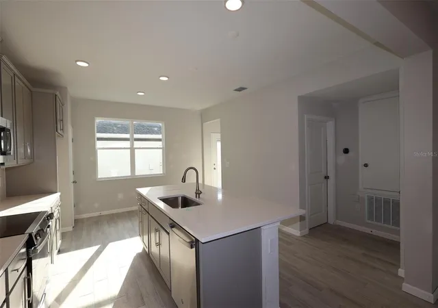 Photo 4 of Townhouse for sale at 1341 Hyde St, Saint Cloud, FL 34771 | MLS# O6452238 | Listing updated on 2026-10-27