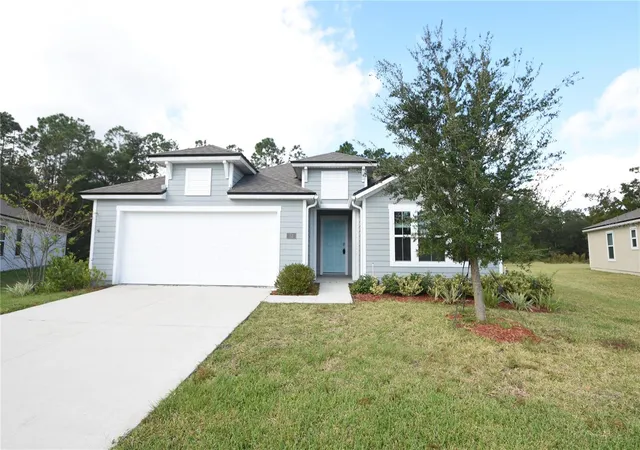 Photo 1 of Single family home for sale at 52 Oakleaf Way, Palm Coast, FL 32137 | MLS# FC322326 | Listing updated on 2026-10-24