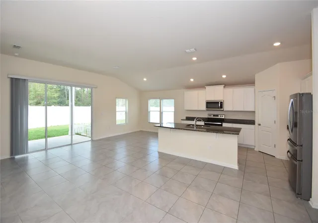 Photo 3 of Single family home for sale at 52 Oakleaf Way, Palm Coast, FL 32137 | MLS# FC322326 | Listing updated on 2026-10-24
