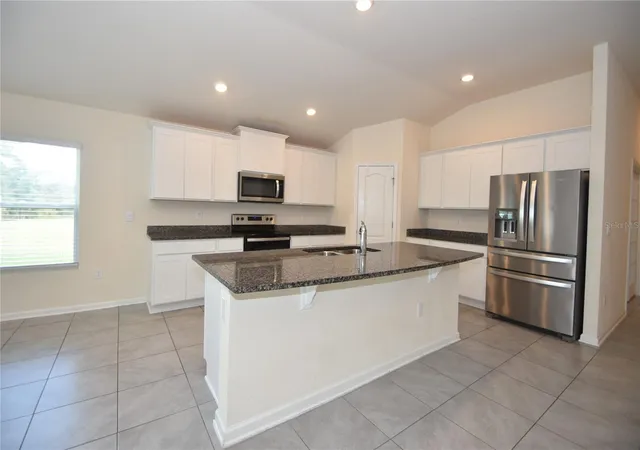 Photo 4 of Single family home for sale at 52 Oakleaf Way, Palm Coast, FL 32137 | MLS# FC322326 | Listing updated on 2026-10-24