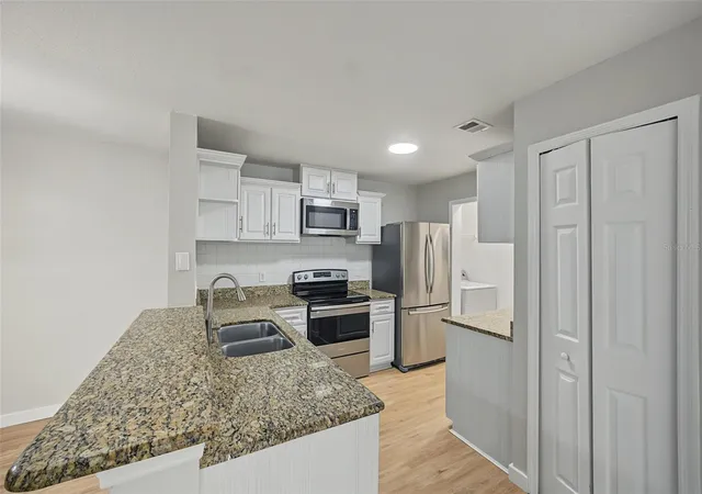 Photo 3 of Condo for sale at 7524 Seurat St #12202, Orlando, FL 32819 | MLS# O6452268 | Listing updated on 2026-10-23