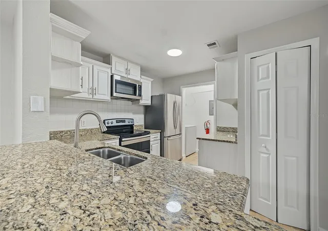 Photo 4 of Condo for sale at 7524 Seurat St #12202, Orlando, FL 32819 | MLS# O6452268 | Listing updated on 2026-10-23