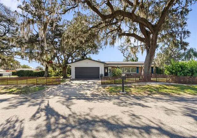 Photo 2 of Single family home for sale at 1595 Peaceful Ln N, Clearwater, FL 33756 | MLS# TB8560994 | Listing updated on 2026-10-24