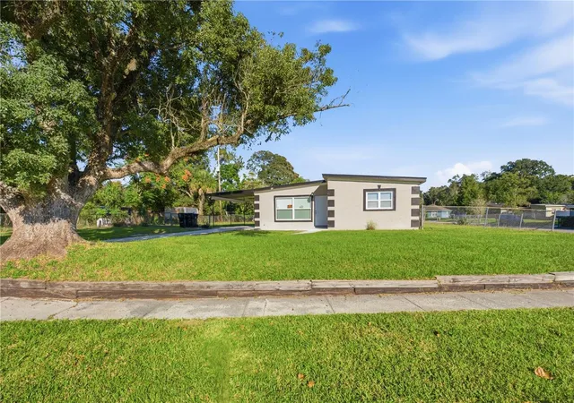 Photo 2 of Single family home for sale at 1311 Lawne Blvd, Orlando, FL 32808 | MLS# O6452319 | Listing updated on 2026-10-29