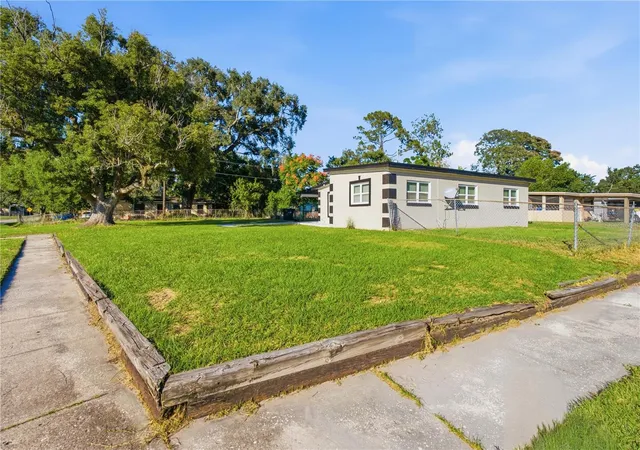 Photo 3 of Single family home for sale at 1311 Lawne Blvd, Orlando, FL 32808 | MLS# O6452319 | Listing updated on 2026-10-29