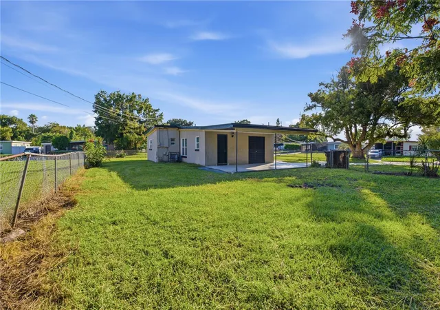Photo 4 of Single family home for sale at 1311 Lawne Blvd, Orlando, FL 32808 | MLS# O6452319 | Listing updated on 2026-10-29