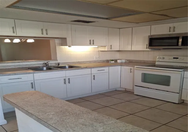 Photo 2 of Condo for sale at 831 Maple Ct #103, Dunedin, FL 34698 | MLS# TB8561016 | Listing updated on 2026-10-23