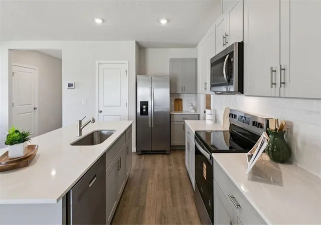Photo 4 of Single family home for sale at 906 Bluet Dr, Port Orange, FL 32129 | MLS# O6452382 | Listing updated on 2026-10-24
