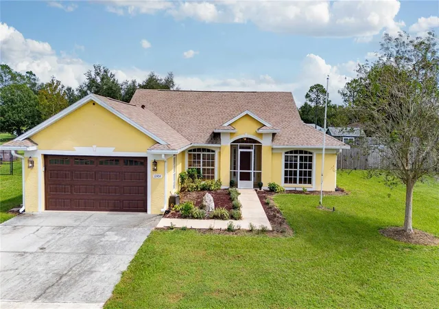 Single family home for sale at 12404 Palm Ridge Dr, SAN ANTONIO, FL 33576 | MLS# TB8561078