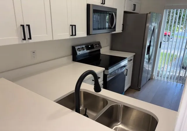 Photo 4 of Townhouse for sale at 949 Pebble Crk Cir, Orlando, FL 32824 | MLS# S5160110 | Listing updated on 2026-10-30