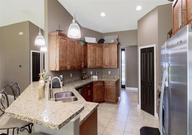 Photo 3 of Single family home for sale at 1438 Sw Devera Ave, Port Saint Lucie, FL 34953 | MLS# O6452485 | Listing updated on 2026-10-24