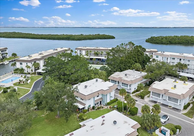 Photo 1 of Townhouse for sale at 575 Sutton Pl, Longboat Key, FL 34228 | MLS# A4710734 | Listing updated on 2026-10-29