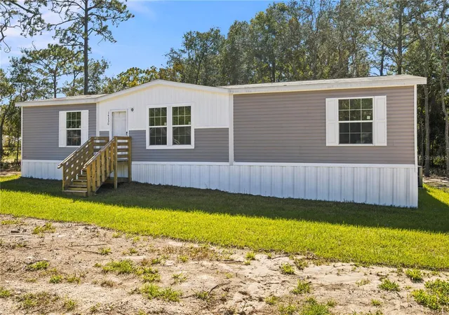 Photo 2 of Manufactured home for sale at 14330 SE 28th Street, Morriston, FL 32668 | MLS# OM734633 | Listing updated on 2026-10-28