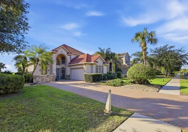Photo 2 of Single family home for sale at 100 Emerald Lake Dr, Palm Coast, FL 32137 | MLS# FC322349 | Listing updated on 2026-10-28