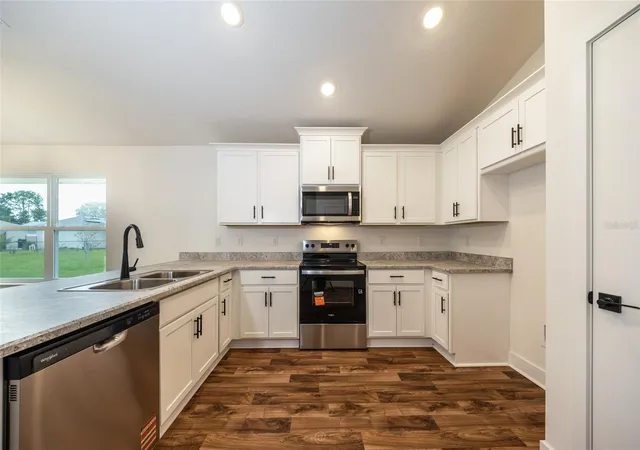 Photo 2 of Single family home for sale at 46 Russell Dr, Palm Coast, FL 32164 | MLS# FC322352 | Listing updated on 2026-10-25