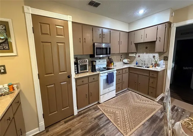 Photo 2 of Single family home for sale at 12325 Hicks Rd, Hudson, FL 34669 | MLS# TB8561298 | Listing updated on 2026-10-27