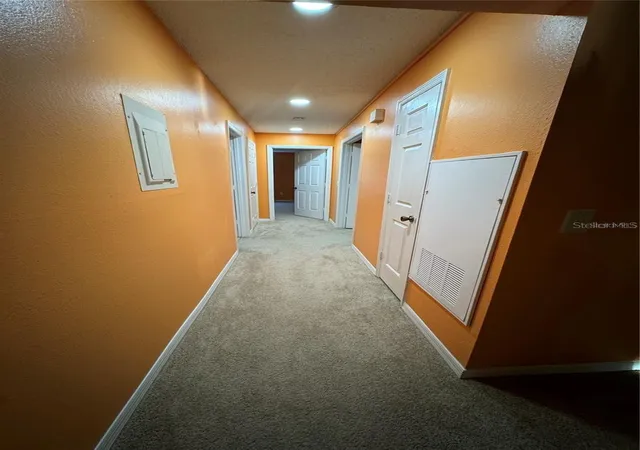 Listing Photo 1 - Condo for sale in building located at 4136 Versailles Dr, ORLANDO, FL 32808 - Unit #4136D