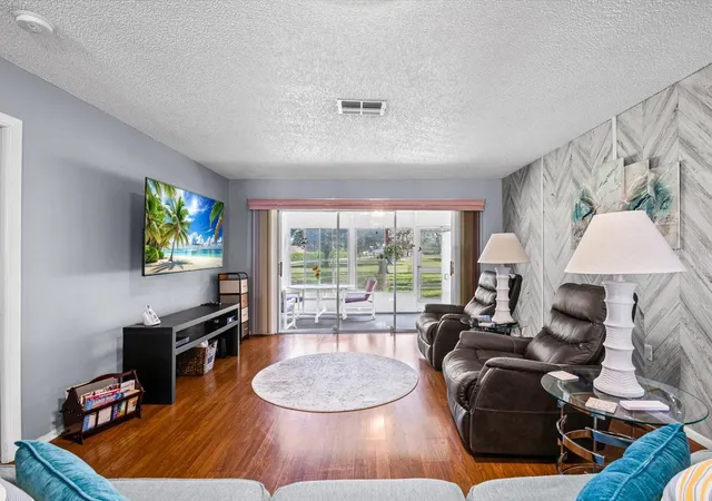 Photo 2 of House for sale at 11430 Carriage Hl Dr #2, Port Richey, FL 34668 | MLS# TB8561368 | Listing updated on 2026-10-29