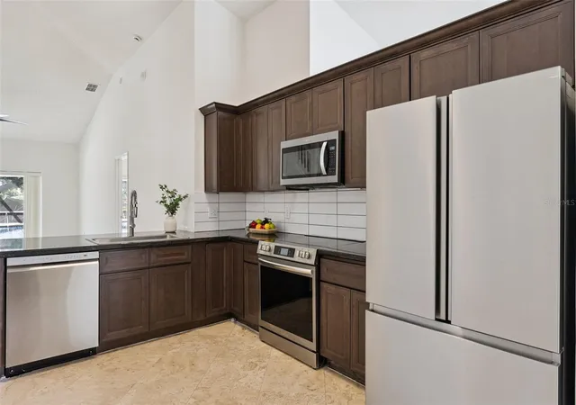 Photo 4 of Single family home for sale at 13714 Huntwick Dr, Orlando, FL 32837 | MLS# O6452647 | Listing updated on 2026-10-28