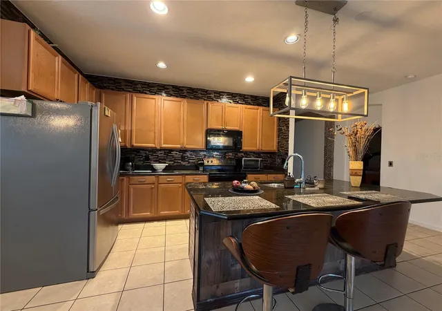 Photo 3 of Single family home for sale at 866 Marisa Ln, Kissimmee, FL 34744 | MLS# S5160182 | Listing updated on 2026-10-28