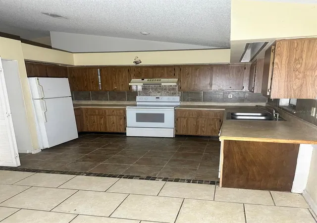 Photo 2 of Single family home for sale at 805 Del Prado Dr, Kissimmee, FL 34758 | MLS# TB8561429 | Listing updated on 2026-10-29