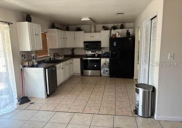 Photo 2 of Single family home for sale at 5920 Norvale Ct, Orlando, FL 32808 | MLS# O6452717 | Listing updated on 2026-10-28