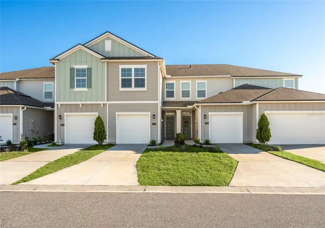 Photo 2 of Townhouse for sale at 119 Redbud Rd, Palm Coast, FL 32137 | MLS# FC322367 | Listing updated on 2026-10-28