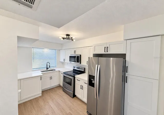 Listing Photo 2 - Condo for sale in building located at 7333 Abonado Rd, TAMPA, FL 33615 - Unit #7534