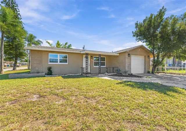 Photo 1 of Single family home for sale at 1102 Croydon Ln, Holiday, FL 34691 | MLS# TB8561521 | Listing updated on 2026-10-28
