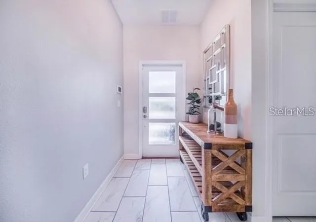 Photo 2 of Townhouse for sale at 8977 Cabot Cliffs Dr, Davenport, FL 33896 | MLS# O6452787 | Listing updated on 2026-10-29