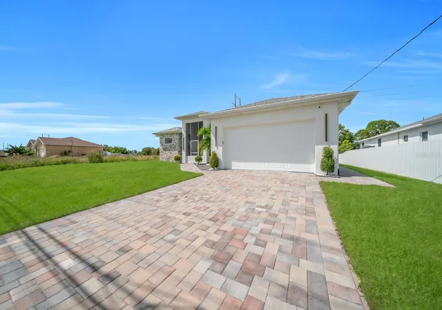 Photo 2 of Single family home for sale at 1106 Floyd Ave S, Lehigh Acres, FL 33976 | MLS# O6452829 | Listing updated on 2026-10-28