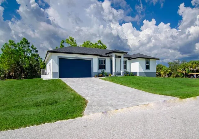 Single family home for sale at 10441 Monticello Dr, PORT CHARLOTTE, FL 33981 | MLS# O6452839