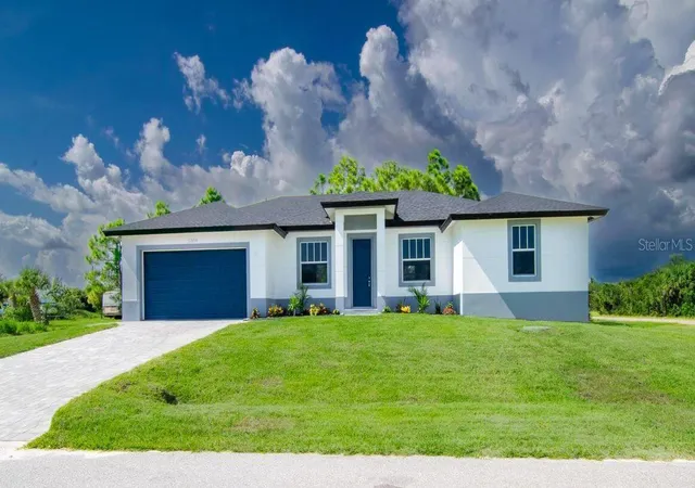 Photo 1 of Single family home for sale at 10441 Monticello Dr, Port Charlotte, FL 33981 | MLS# O6452839 | Listing updated on 2026-10-29