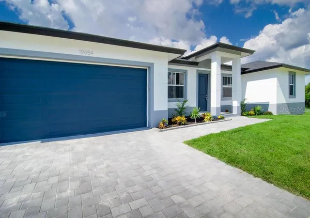 Photo 2 of Single family home for sale at 10441 Monticello Dr, Port Charlotte, FL 33981 | MLS# O6452839 | Listing updated on 2026-10-29