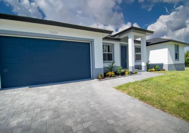 Photo 4 of Single family home for sale at 10441 Monticello Dr, Port Charlotte, FL 33981 | MLS# O6452839 | Listing updated on 2026-10-29