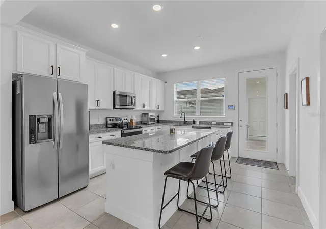 Photo 2 of Townhouse for sale at 14538 Orchid Is Dr, Orlando, FL 32827 | MLS# O6452925 | Listing updated on 2026-10-30