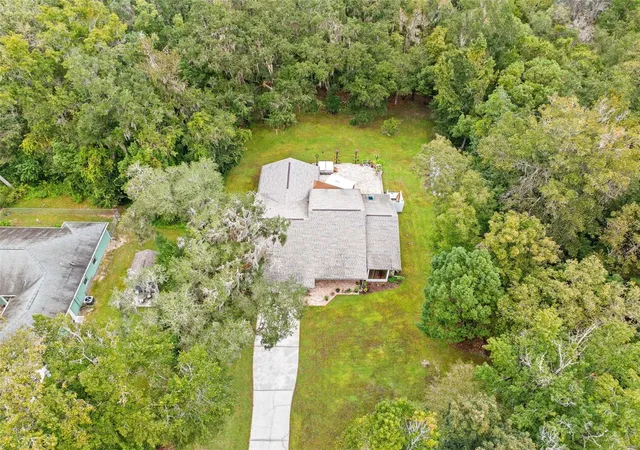 Photo 2 of Single family home for sale at 410 Hillside Ct, Brooksville, FL 34601 | MLS# W7890663 | Listing updated on 2026-10-29
