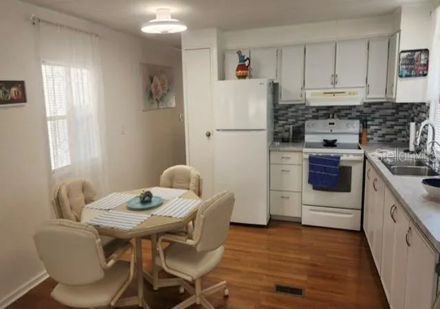 Photo 4 of Manufactured home for sale at 1414 21st Avenue Dr W, Bradenton, FL 34205 | MLS# A4710937 | Listing updated on 2026-10-30