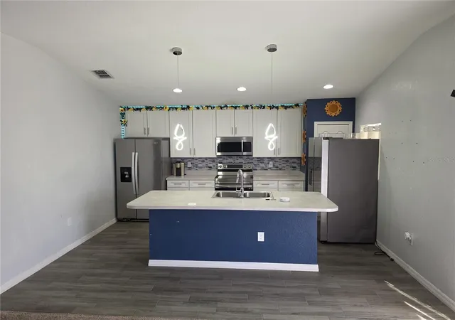 Photo 2 of Single family home for sale at 205 Arbuthnot St, Winter Haven, FL 33881 | MLS# O6452953 | Listing updated on 2026-10-29