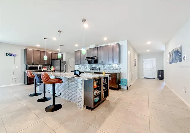 Photo 3 of Single family home for sale at 7333 Millstone St, Spring Hill, FL 34606 | MLS# TB8561820 | Listing updated on 2026-10-29