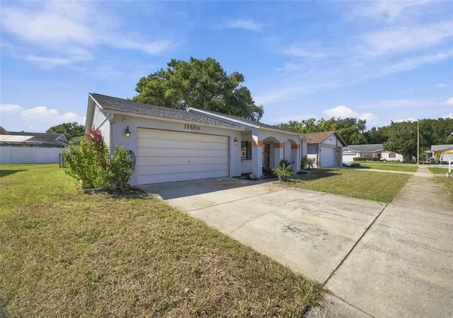 Photo 2 of Single family home for sale at 11409 Possum Trl, Port Richey, FL 34668 | MLS# TB8561850 | Listing updated on 2026-10-28