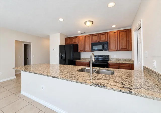 Photo 2 of Single family home for sale at 7606 Leon Ave, Temple Terrace, FL 33637 | MLS# O6453012 | Listing updated on 2026-10-28