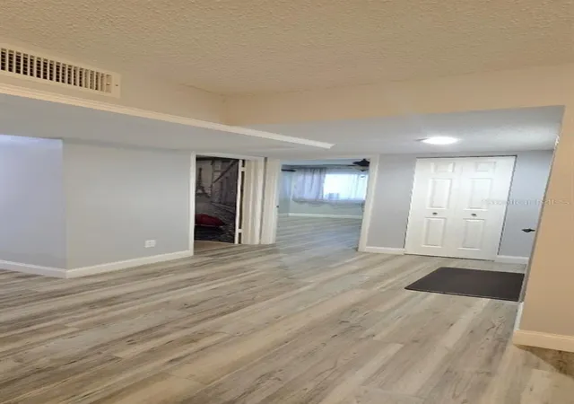 Listing Photo 2 - Condo for sale in building located at 5979 Windhover Dr, ORLANDO, FL 32819 - Unit #7A