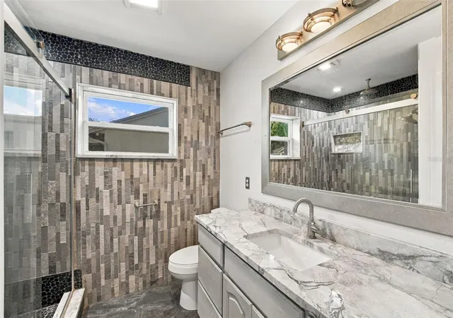 Photo 2 of Single family home for sale at 7958 Glen Abbey Cir, Orlando, FL 32819 | MLS# O6453043 | Listing updated on 2026-10-29