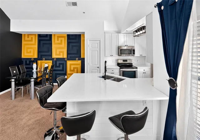 Photo 3 of Townhouse for sale at 9093 Lee Vista Blvd #905, Orlando, FL 32829 | MLS# O6453062 | Listing updated on 2026-10-28