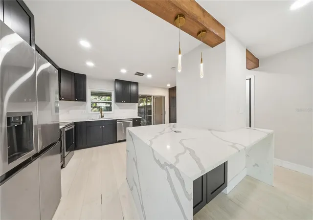 Photo 3 of Townhouse for sale at 935 Hamilton Ct, Palm Harbor, FL 34683 | MLS# TB8561936 | Listing updated on 2026-10-29