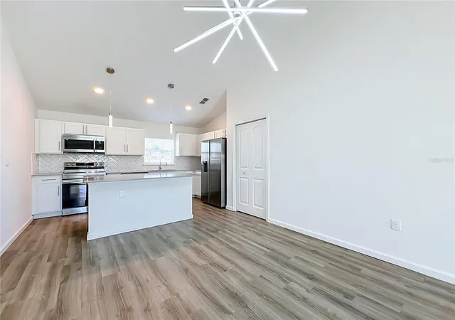Photo 4 of Single family home for sale at 27 Freeland Ln, Palm Coast, FL 32137 | MLS# C7532575 | Listing updated on 2026-10-28