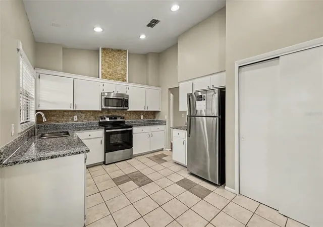 Photo 4 of Single family home for sale at 980 Abby Ridge Ct, Kissimmee, FL 34747 | MLS# O6453096 | Listing updated on 2026-10-31